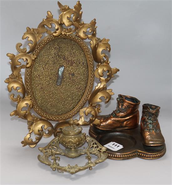 A Florentine style gilt metal picture frame, 36cm, an ormolu ink stand and a coppered metal ashtray